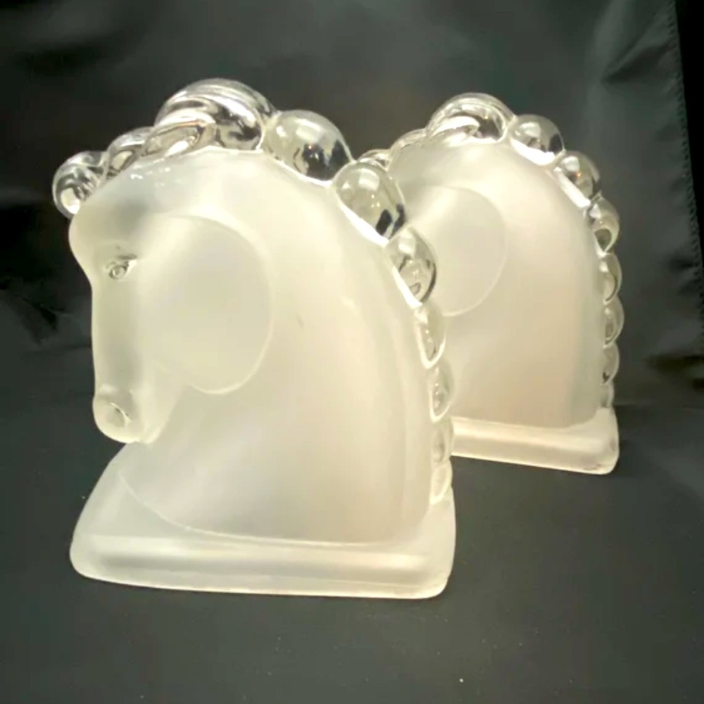 Two vintage frosted trojan horse head bookend figurines